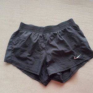 Black Nike running shorts